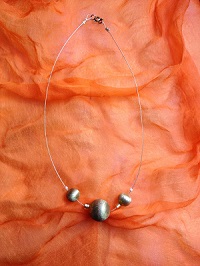 Collier boules couleur or